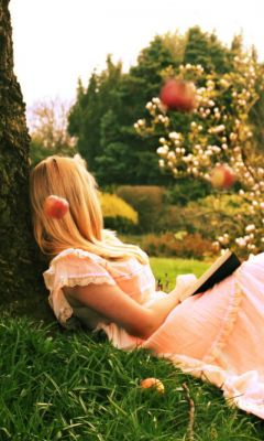 Blonde-Girl-Reading-Book-Under-Tree