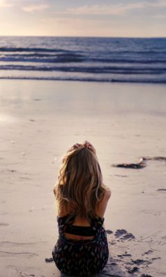 Lonely-Girl-On-Beautiful-Beach