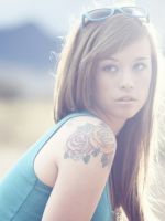 Beautiful-Girl-With-Long-Blonde-Hair-And-Rose-Tattoo
