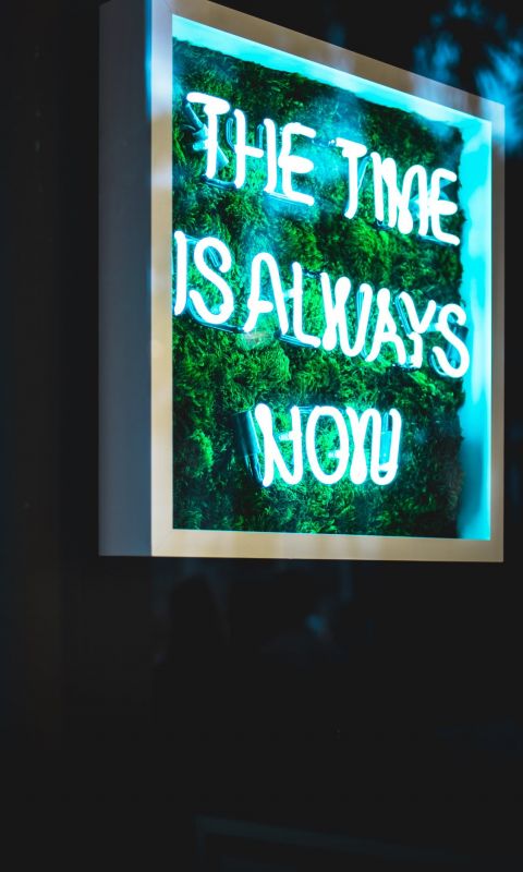 the time is always now neon light signage wallpaper