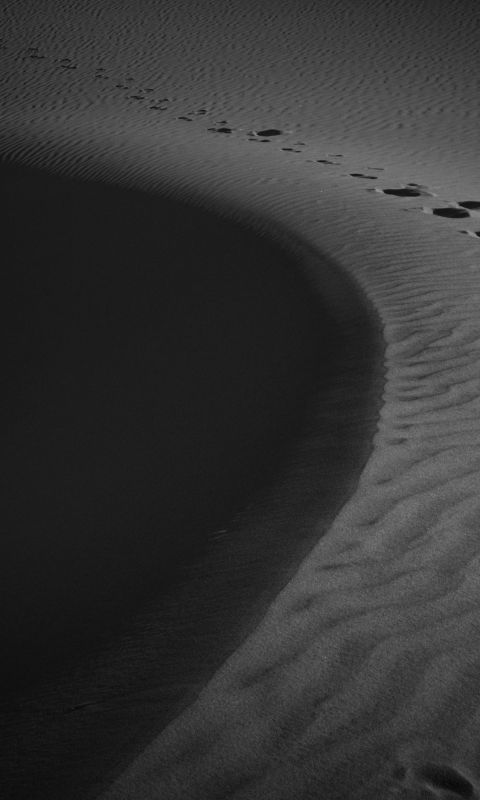 footprints on sand wallpaper