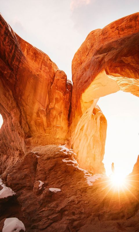 Natural arch during golden hour wallpaper