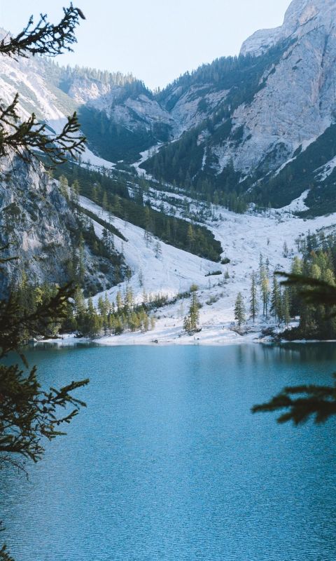 blue calm lake by the icy mountain wallpaper