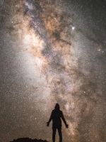 silhouette of a man with the Milky Way background wallpaper