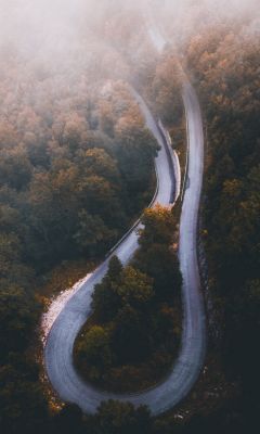 aerial photo of curved highway during daytime wallpaper
